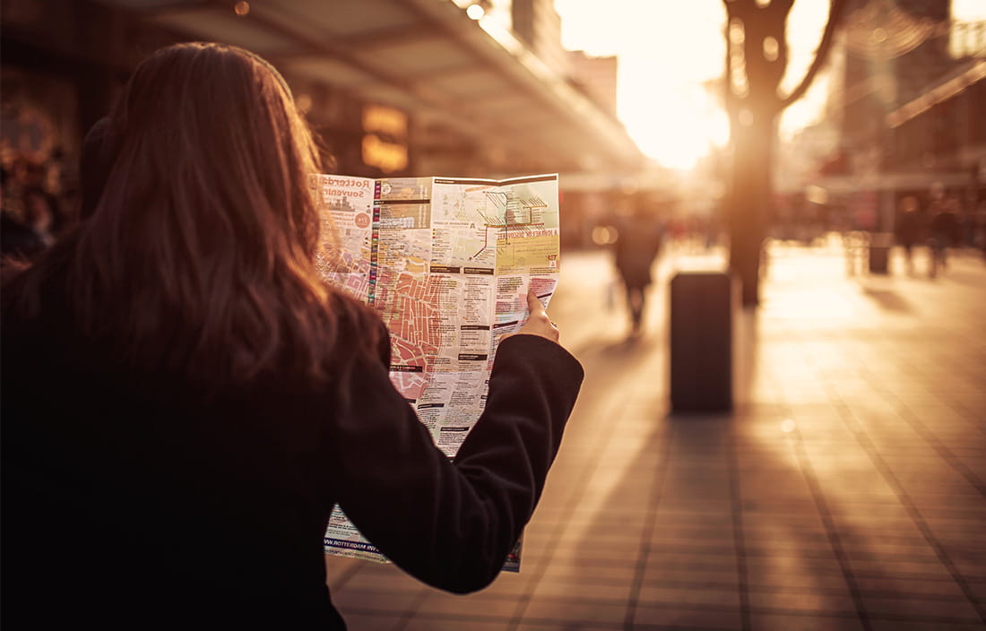 Image of a woman looking at a map