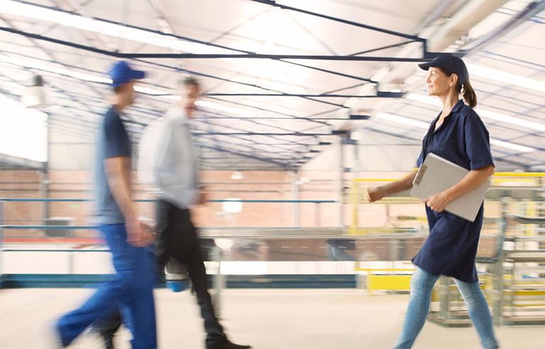 Image of three people walking