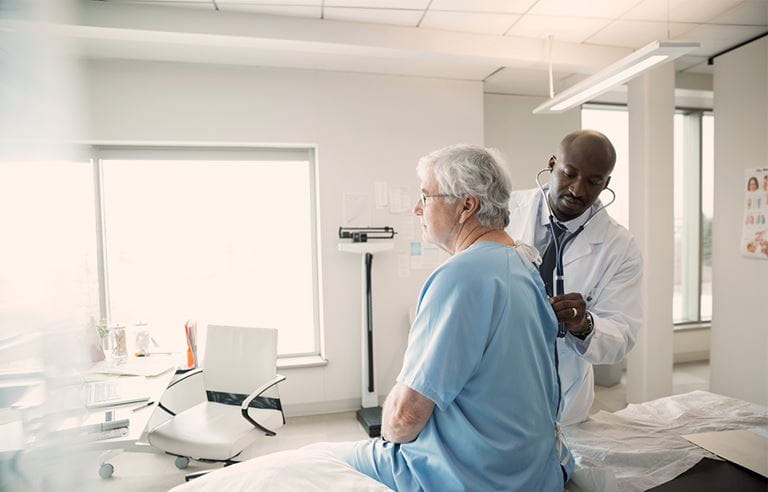 Doctor examining patient