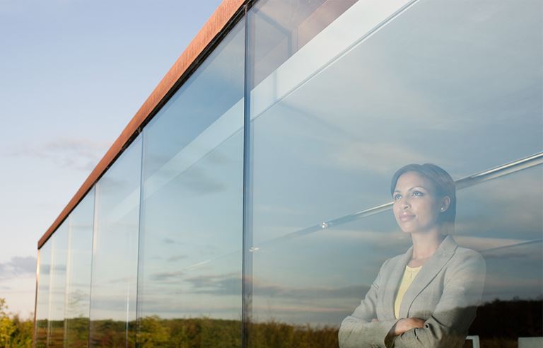 Woman looking out a window