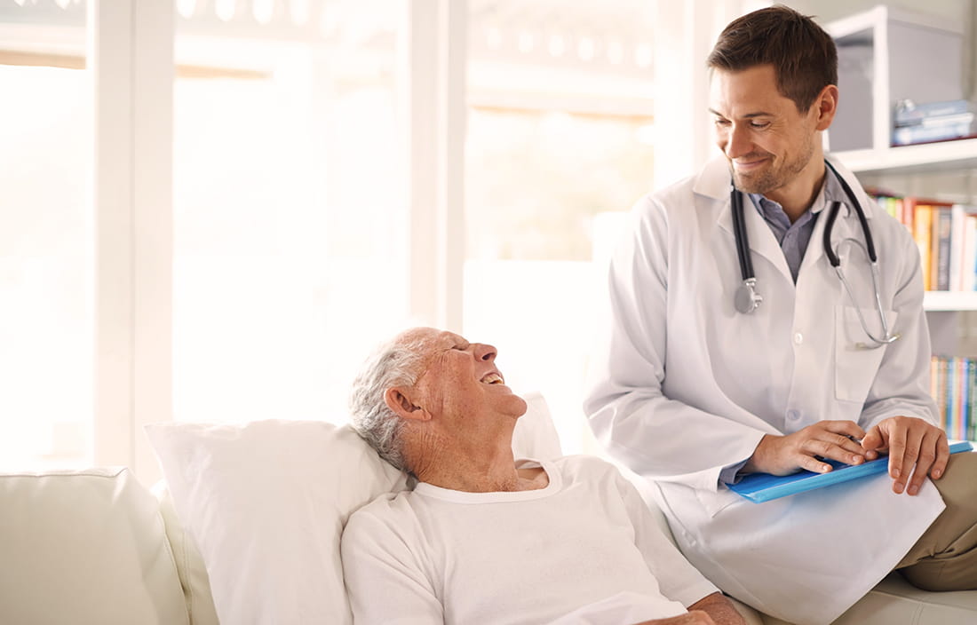 Healthcare provider with senior male patient