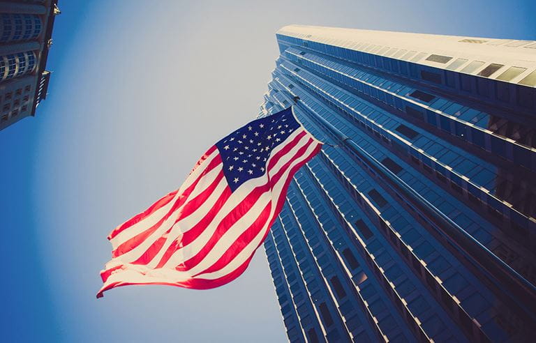 flag waving by building 