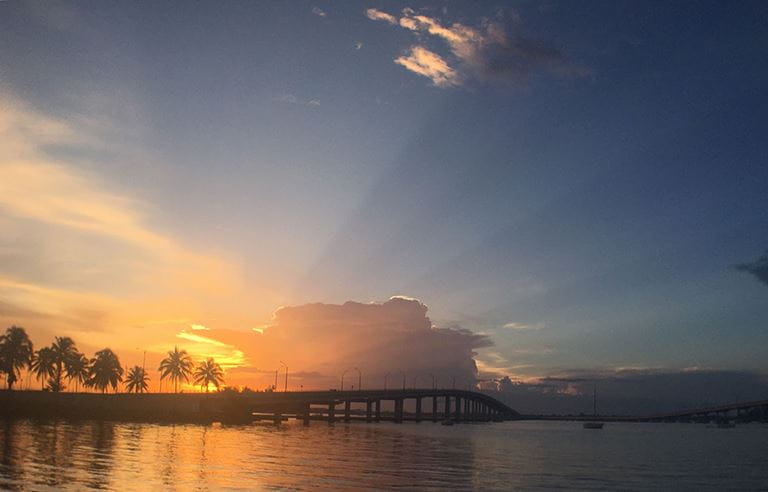 View of sunrise over water.