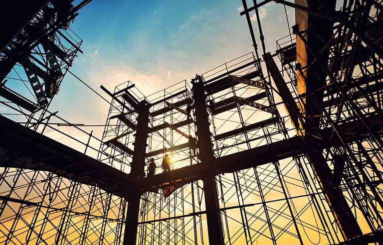 Construction site at sunset.