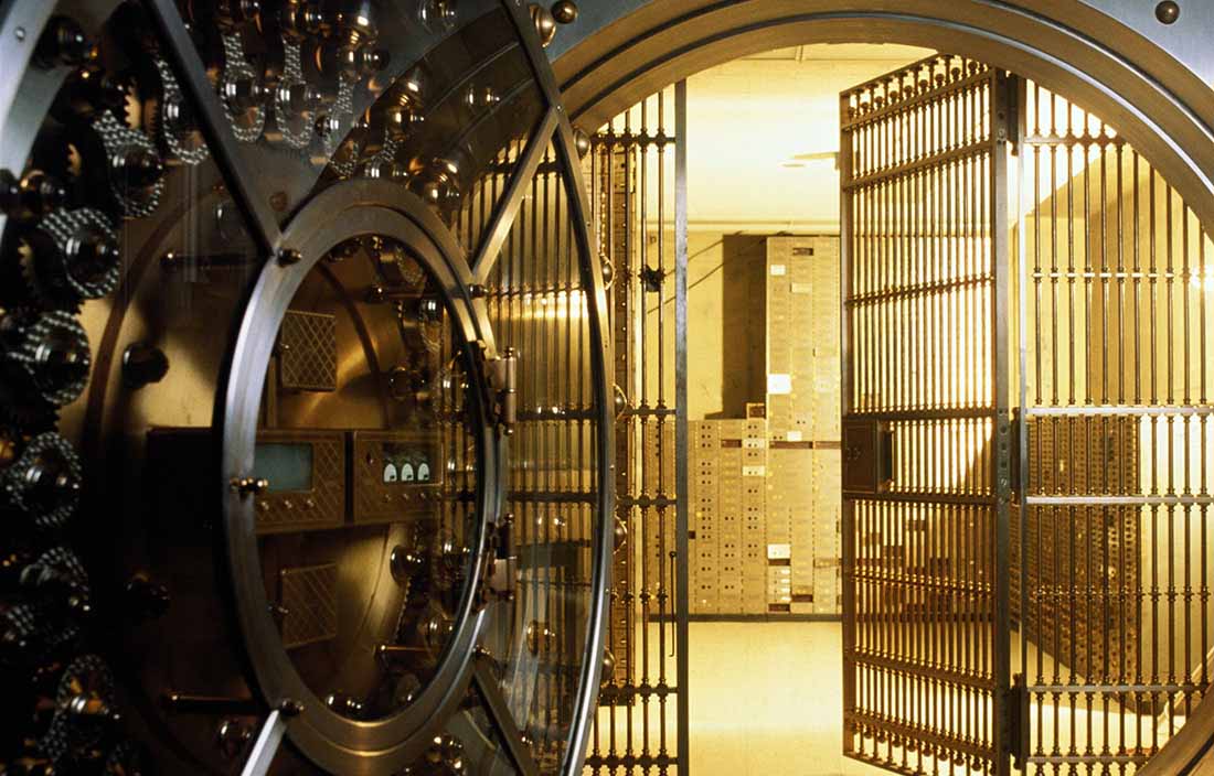 Doors open to golden bank vault.