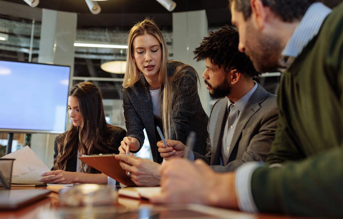 Team of professionals reviewing finances.
