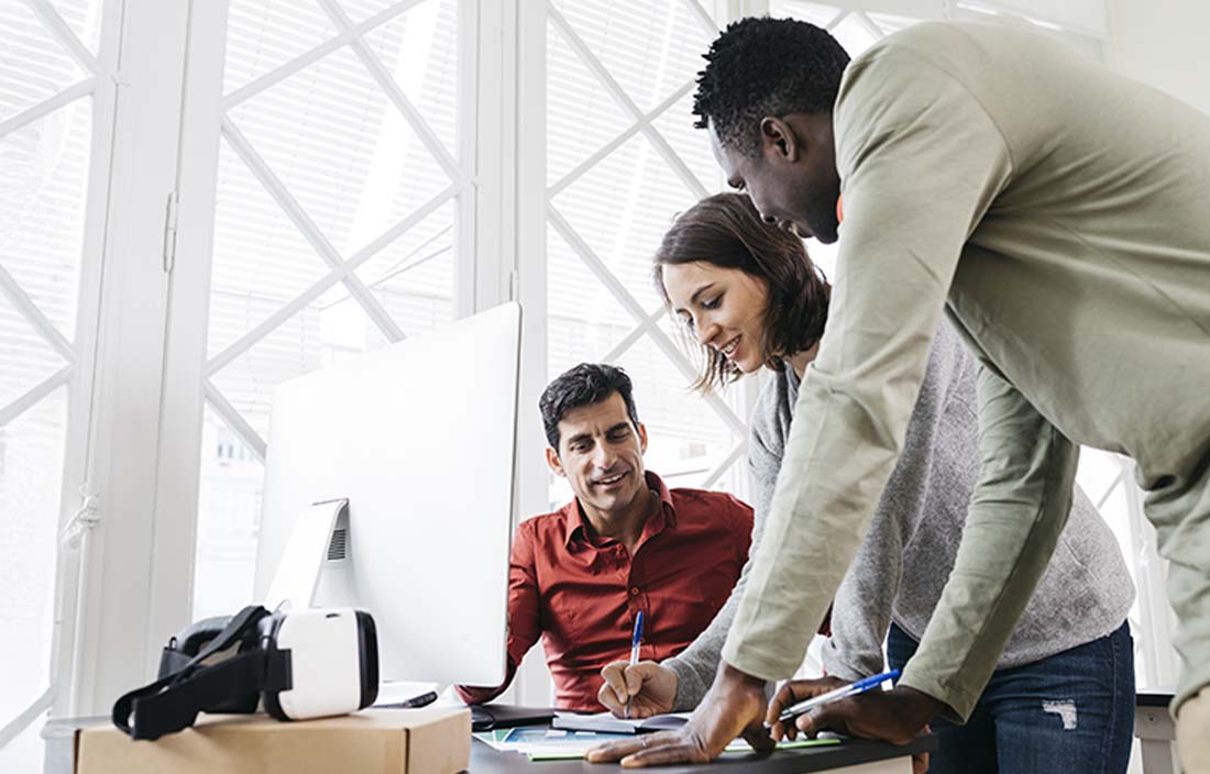 Government workers discussing digital transformation.