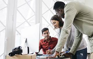 Government workers discussing digital transformation.