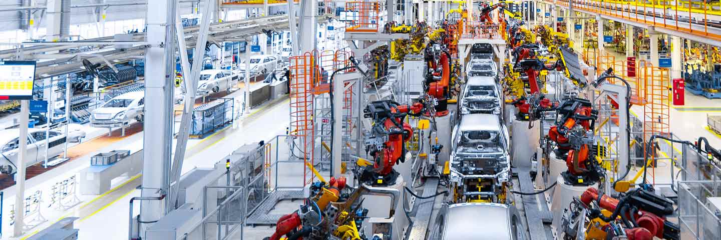 Aerial shot of automotive factory.