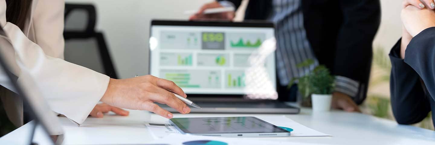 Economic professional reviewing charts and graphs.