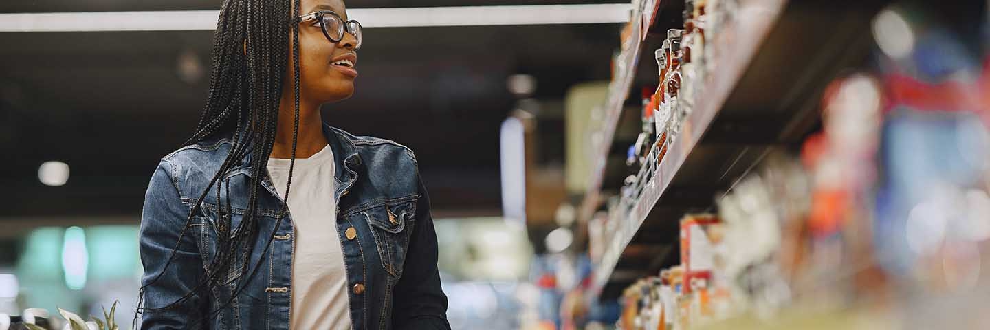 Consumer shopping in a grocery store.