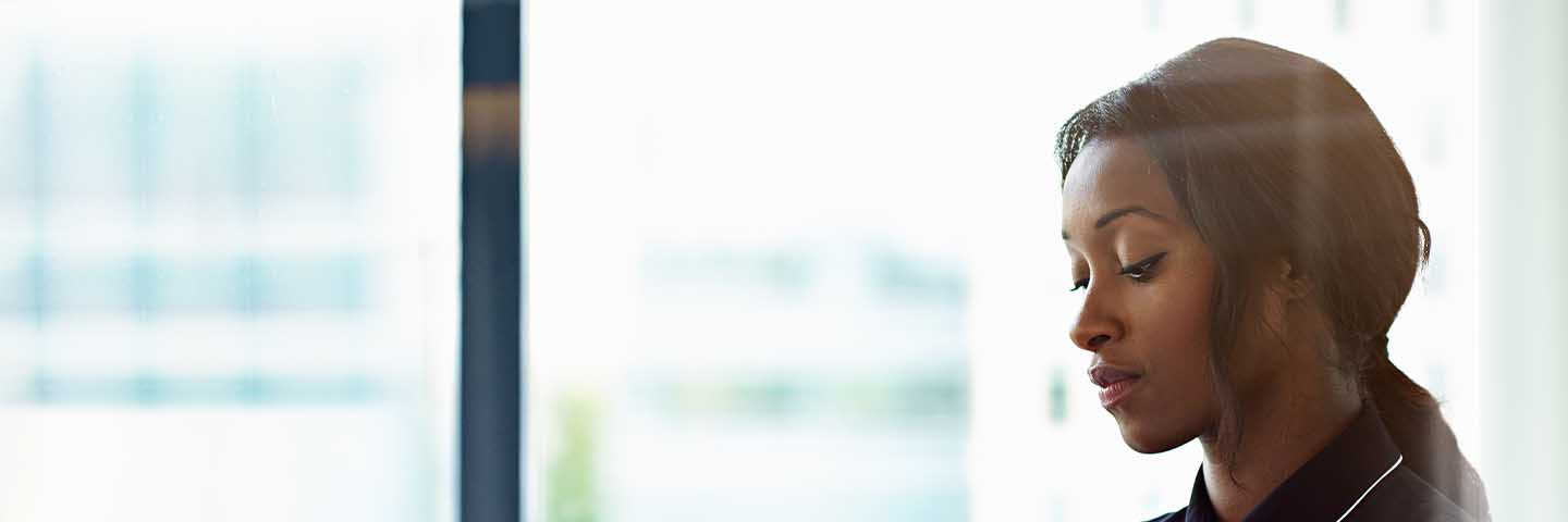 Financial advisor looking at their computer.