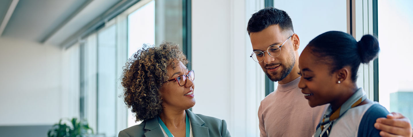 Financial advisor talking to their clients.