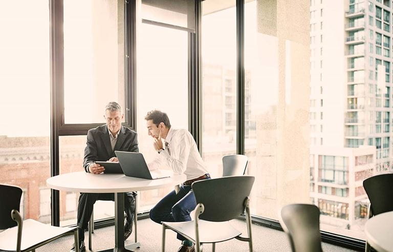 Business people talking at a table