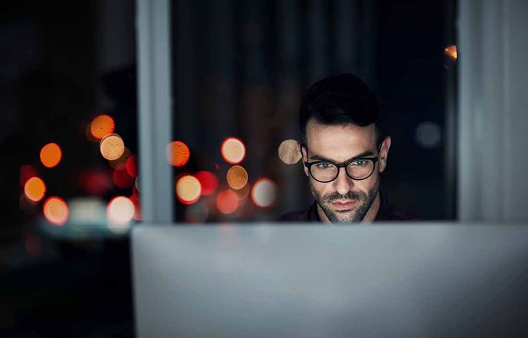 Man working alone at computer