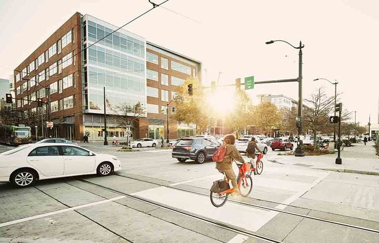 View of a downtown area stop light intersection.