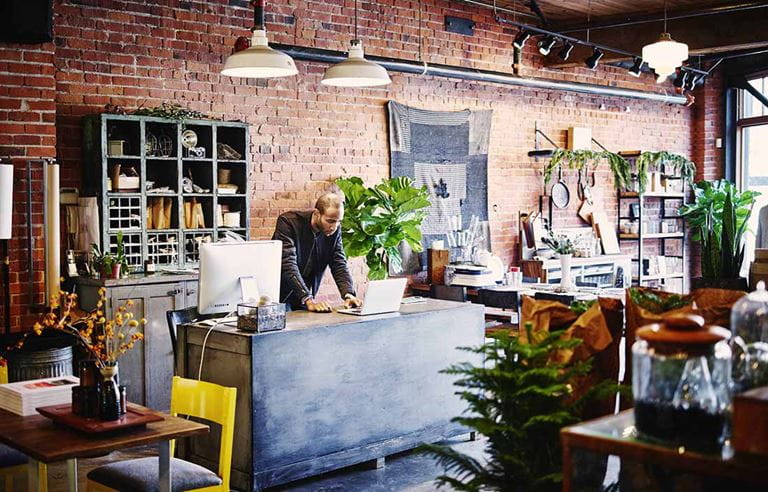 Worker in a modern cafe.