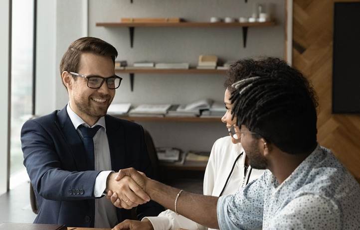 Couple meeting their financial advisor.