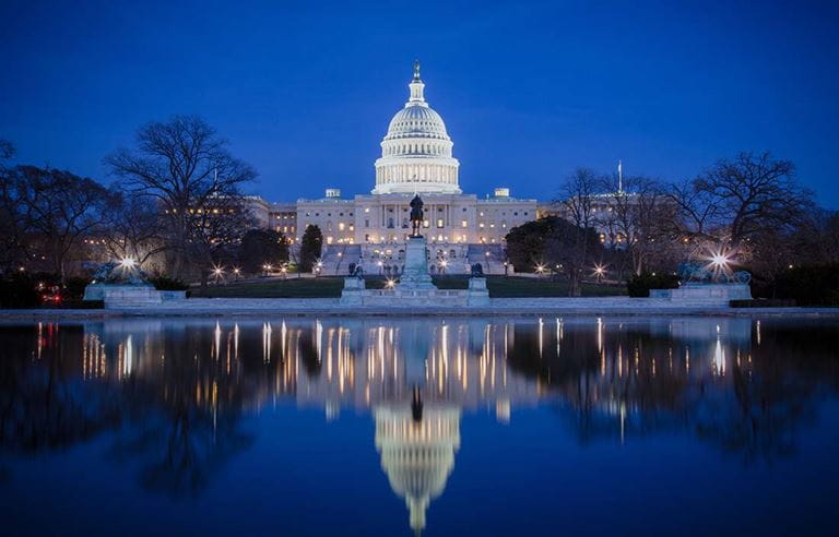 View of U.S. government building at night.