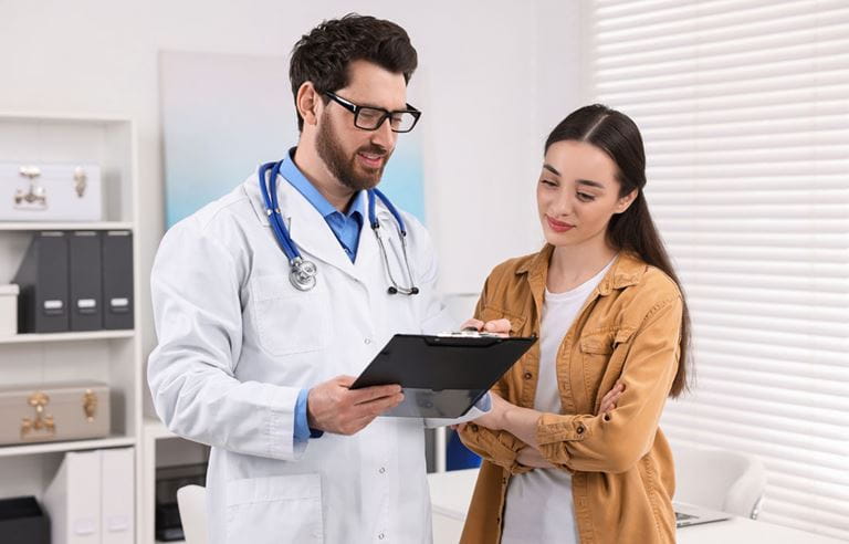 Medical doctor talking to their patient.