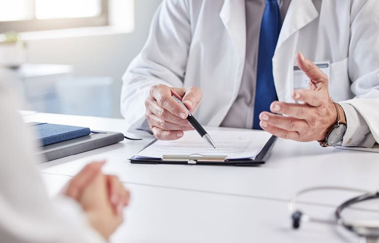 Doctor talking to their patient.