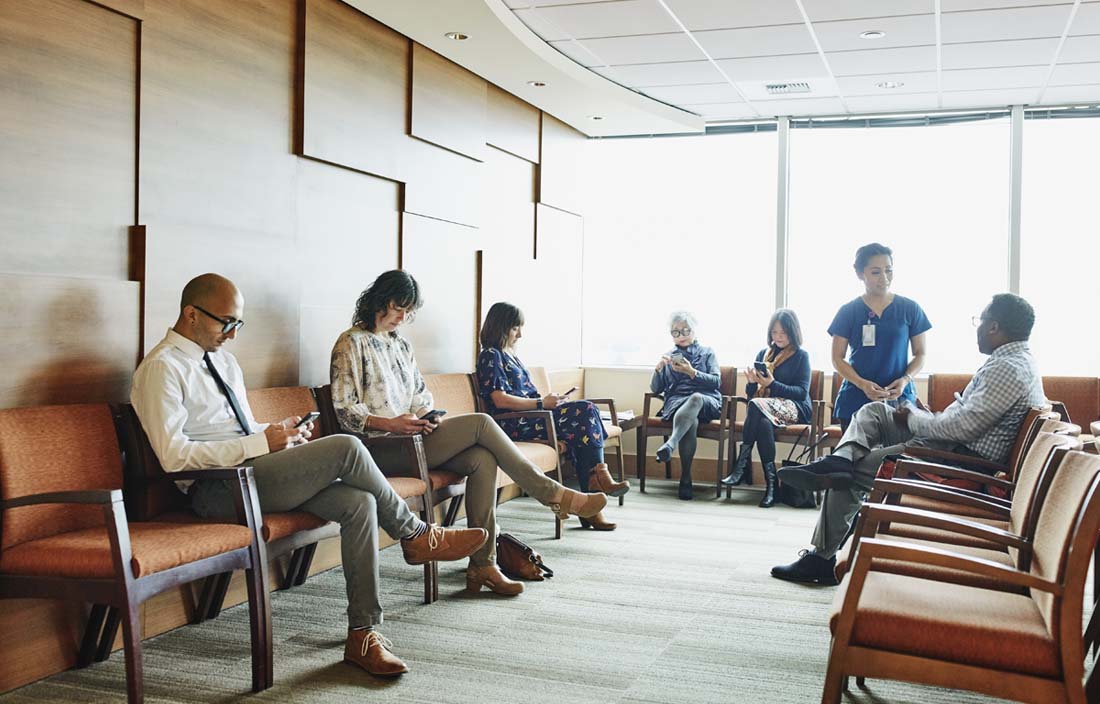 Patients in a doctor's waiting room. 