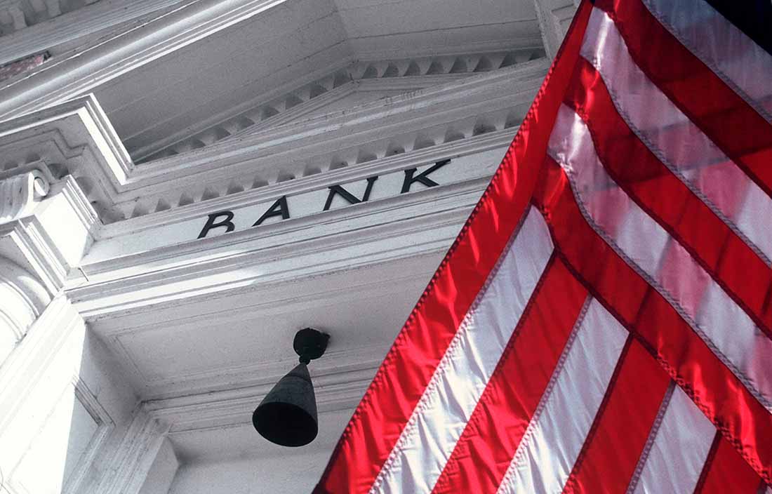 Bank building with American flag.