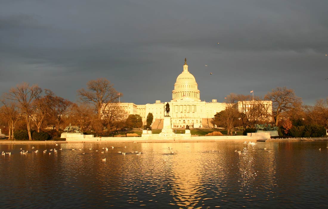 View of the U.S. Capitol from a distance during evening hours