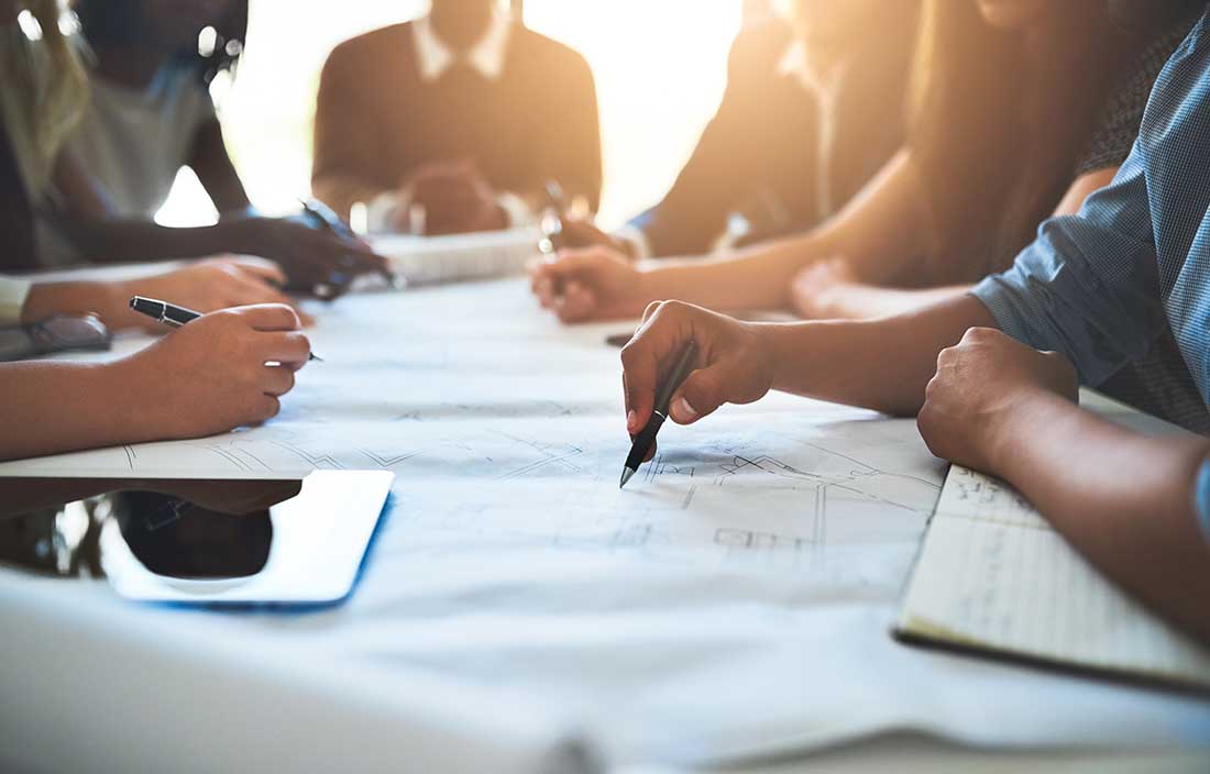 Group of financial advisors at a meeting.