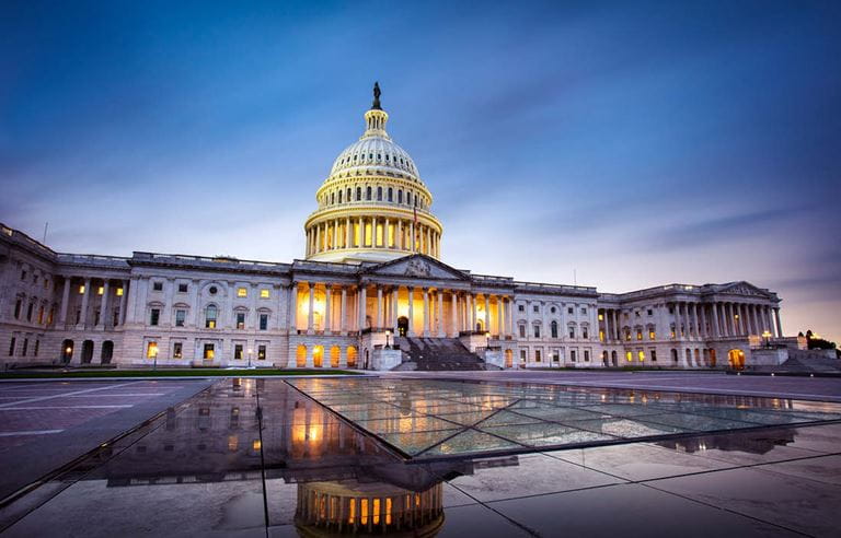 View of U.S. Capitol building at dusk.