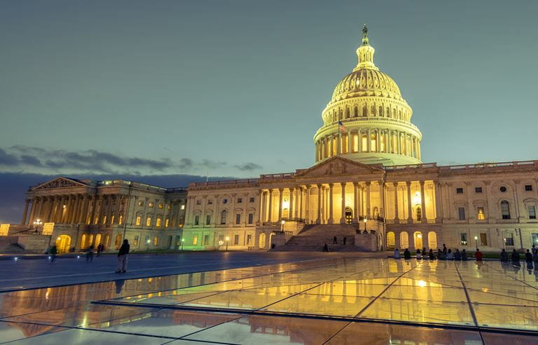 Federal tax building at night.