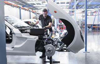 Factory worker in an automotive factory.