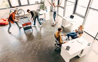 Coworkers in a modern office environment.