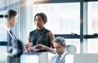 Business professionals in a modern office.