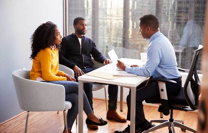 Financial advisor meeting with their client.