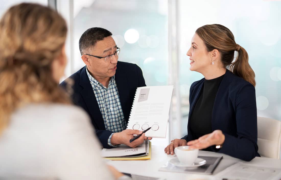 Public sector professionals in a meeting.
