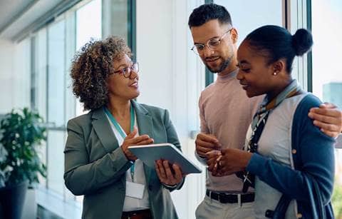 Couple talking to their financial advisor.