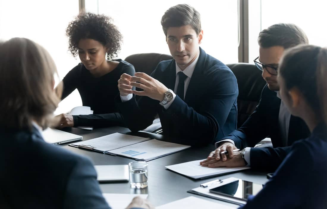 Group of business professional discussing tax changes.