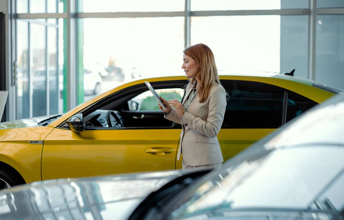 Person at a car dealership.