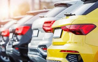 Cars in a parking lot.