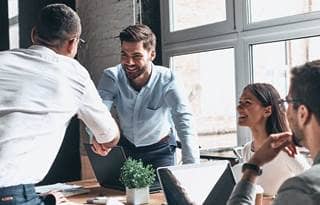 Wealth management advisor meeting their clients.