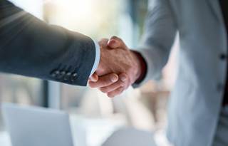 Shaking hands.
