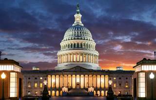U.S. Capitol building at night.