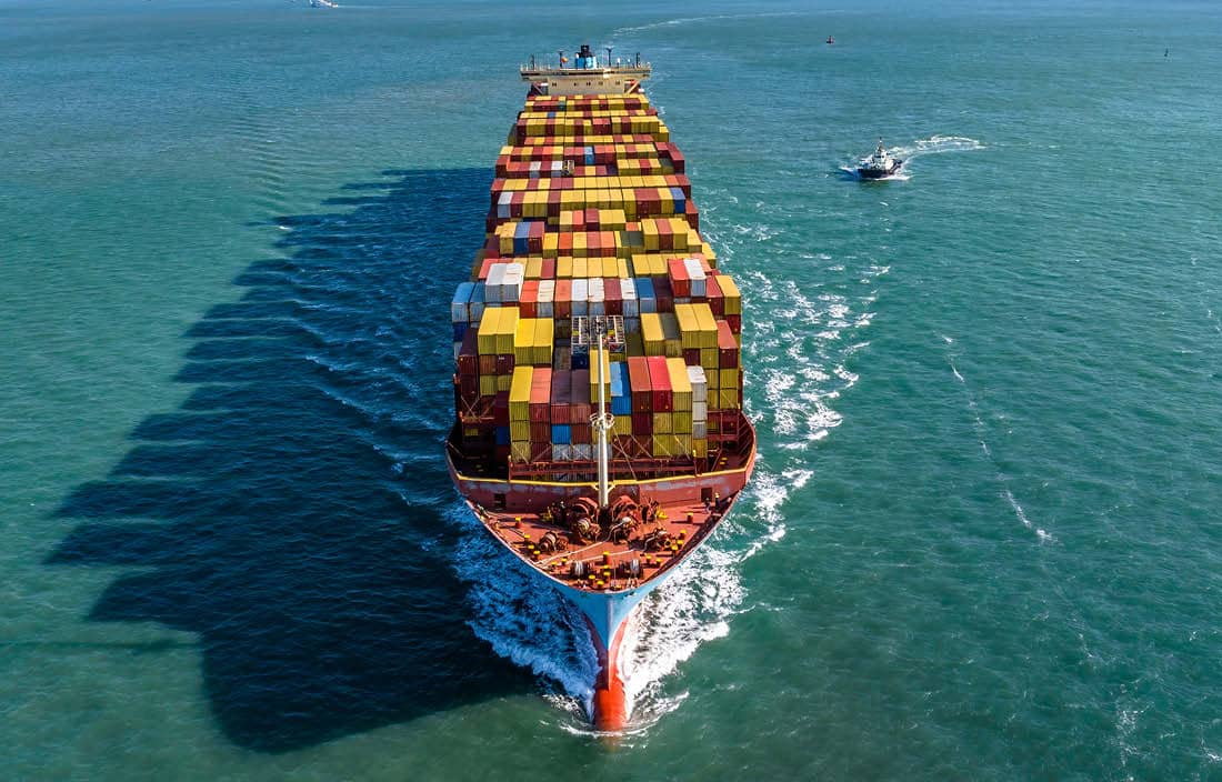 Aerial view of a freighter boat carrying cargo.