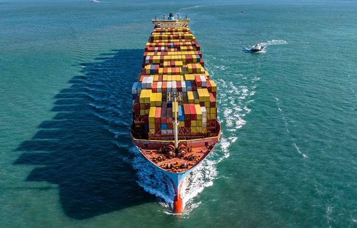 Aerial view of a freighter boat carrying cargo.