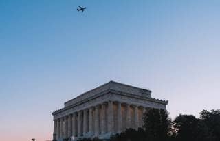 U.S. government building and sky at dusk.