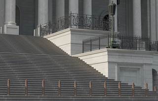 Steps and front entrance of a government building.