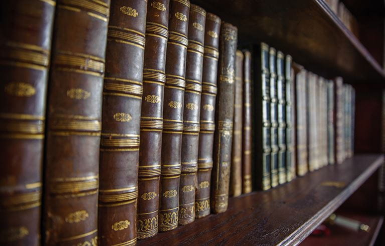 Series of books on a shelf