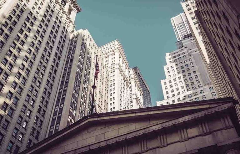 View of blue sky and skyscrapers during the day.