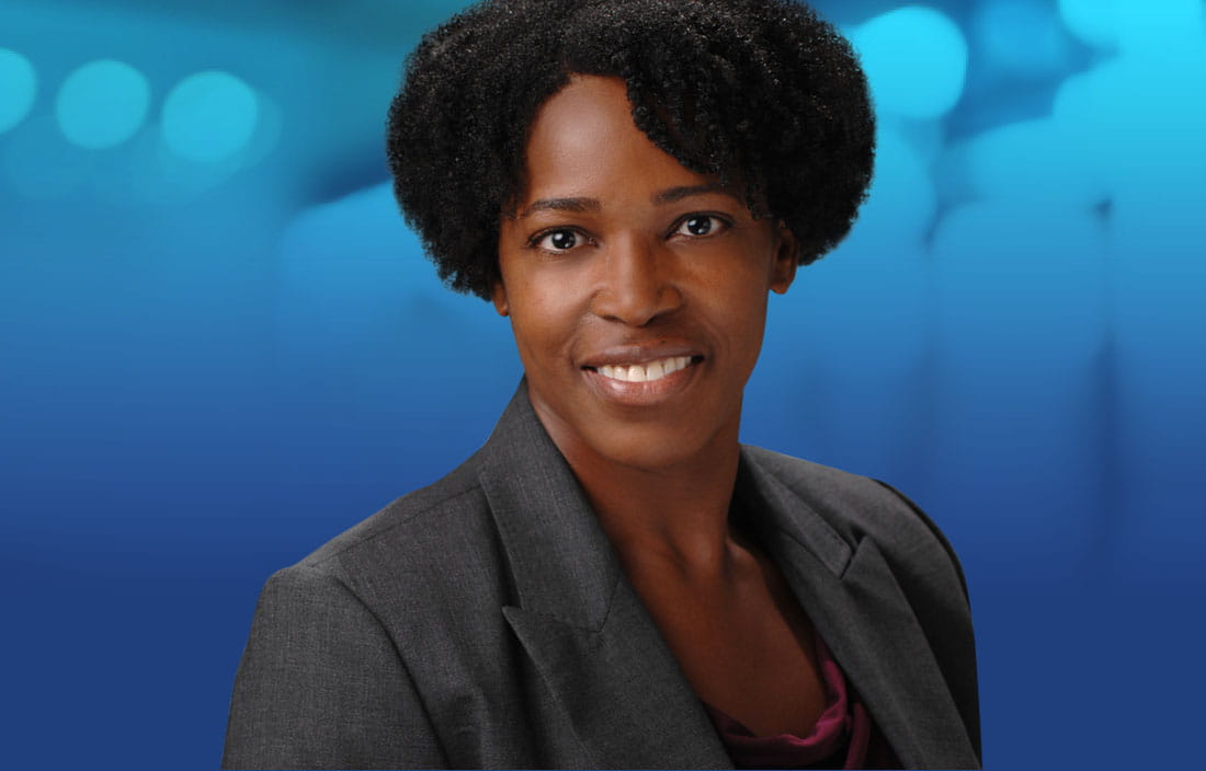 Professional photo of Felicia Donaldson in front of a blue background.